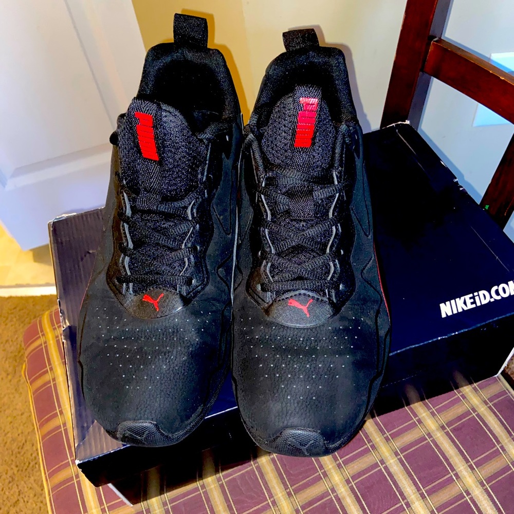Black and Red sneakers Pumas